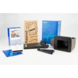 A Polaroid 545i Instant Film Holder,