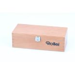 A Small Wooden Display Box Marked 'Rollei',