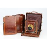 A Thornton Pickard Ruby Half Plate Mahogany Field Camera,