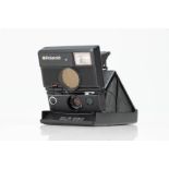 A Polaroid SLR 680 Instant Camera,
