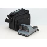A Polaroid Impulse AF Instant Camera,