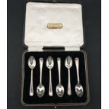 A Cased Set of George VI Silver Rats Tail Tea Spoons and Tongs,