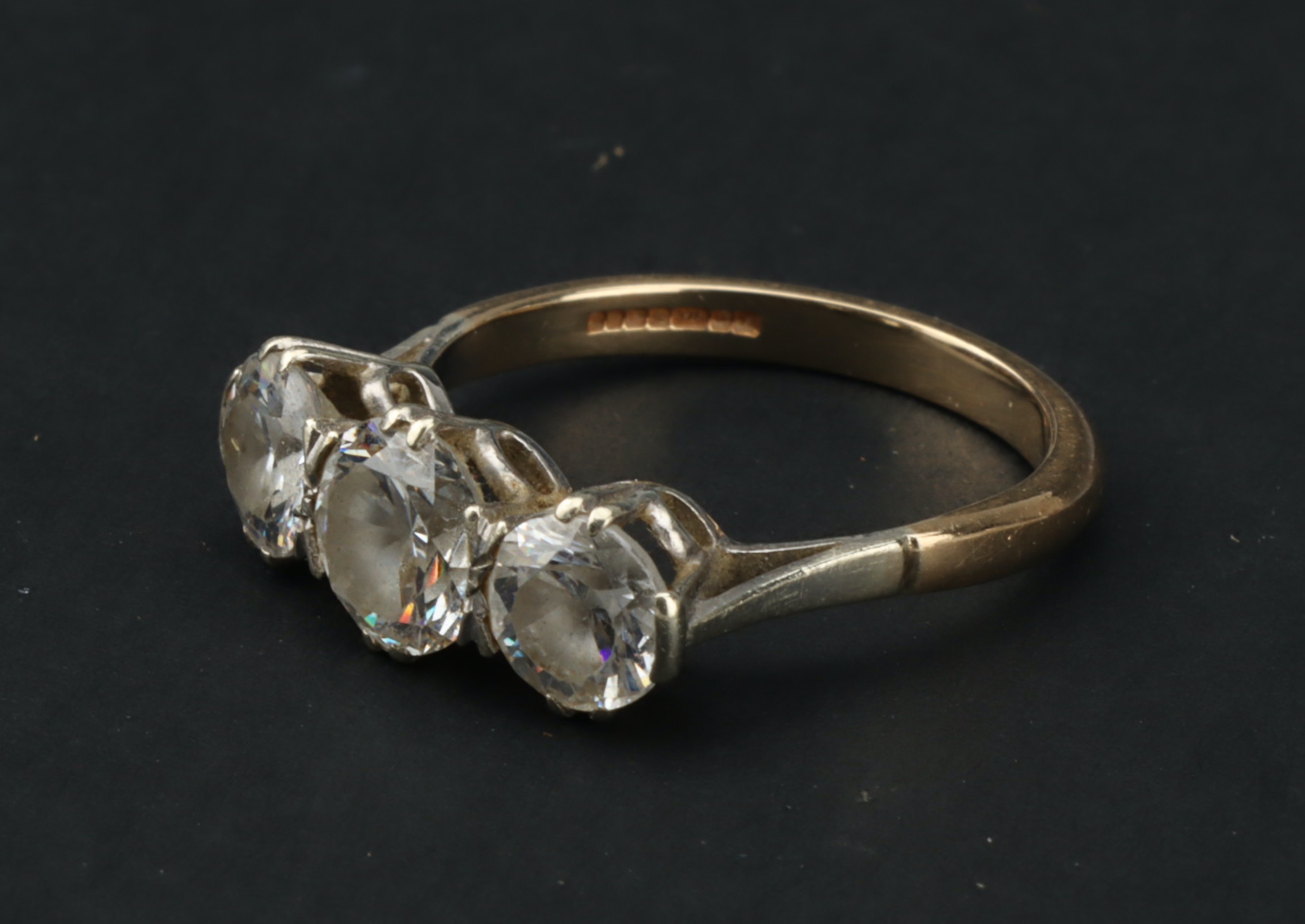 A 9 ct Gold Three Stone Cubic Zirconia Ring, - Image 8 of 9