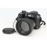 A Fujifilm Finepix S5600 Digital Bridge Camera,