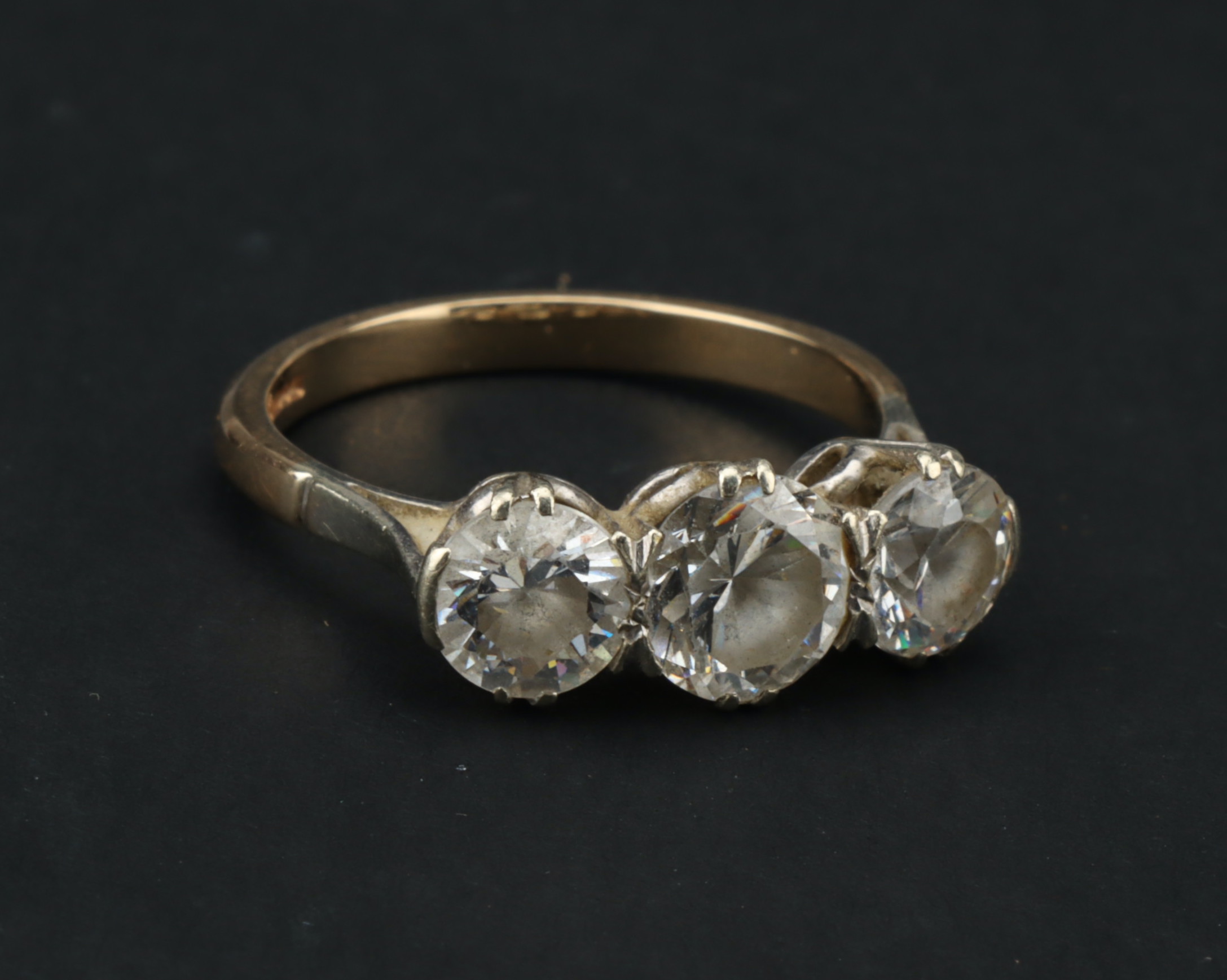 A 9 ct Gold Three Stone Cubic Zirconia Ring, - Image 7 of 9