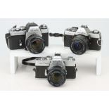 Three Minolta SLR Cameras,