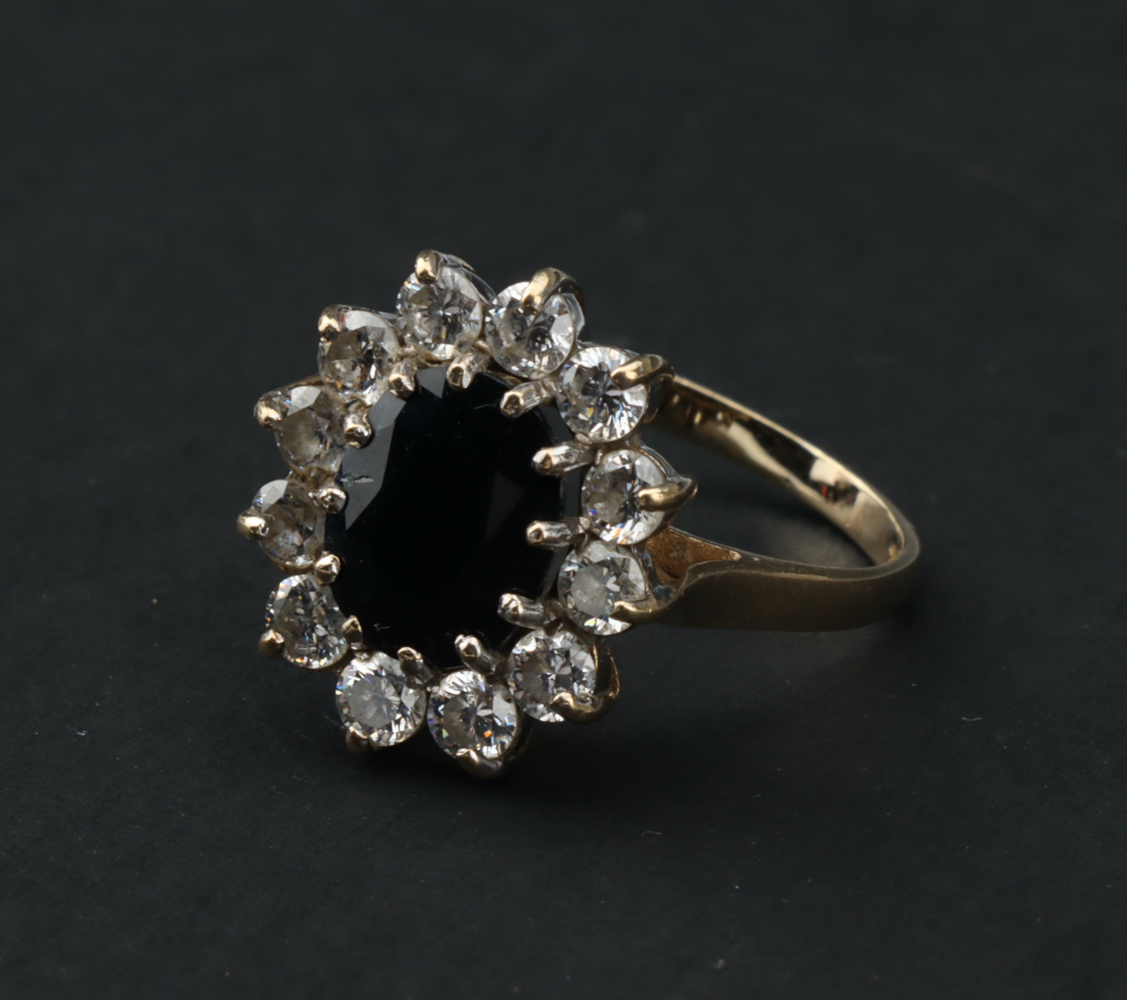 A 9 ct Gold Sapphire and Cubic Zirconia Cluster Ring,