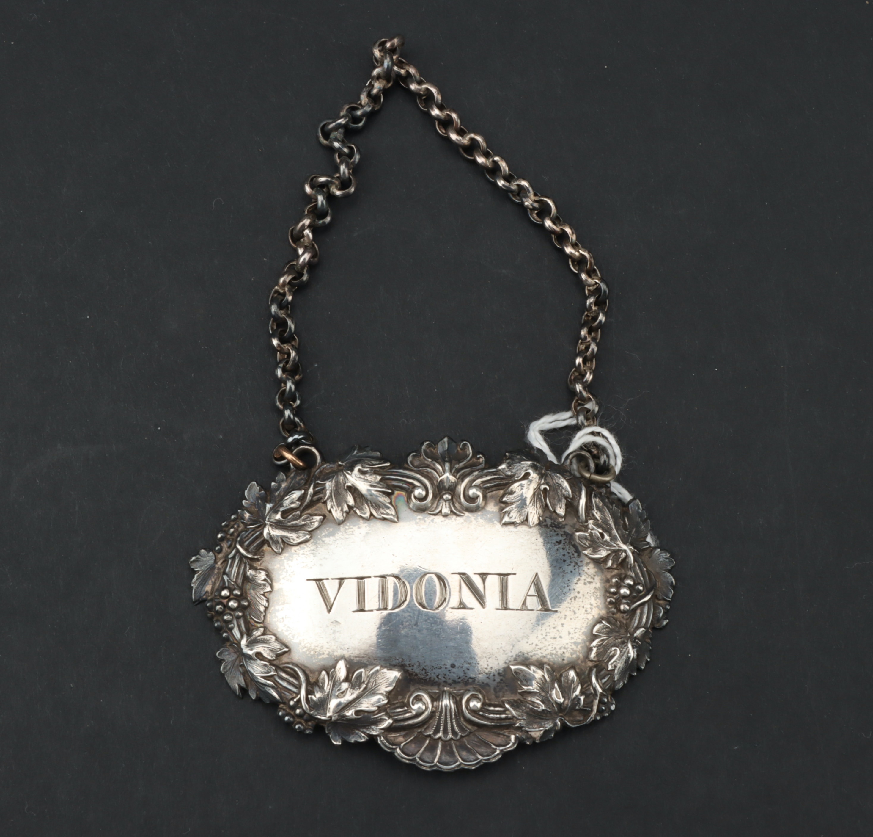 A George IV Silver Wine Label,