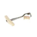 Dentistry, a Tooth Key by Charriere and a Carved Ivory Denture