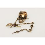 A Modern Brass Momento Mori Fob Style Chain,