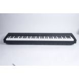 A Yamaha Digital Piano P-45 Keyboard,