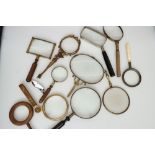 A Collection of 12 Magnifying Glasses,