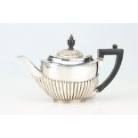 A Hallmarked Silver Bachelors' Teapot,