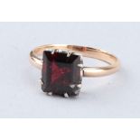 A Pincess Cut Ruby Solitaire Ring,