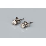 A Pair of 14 ct White Gold Solitaire Stud Earrings,