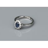 A Sapphire and Diamond Platinum Star Cluster Ring,