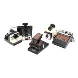 Four Polaroid Cameras,