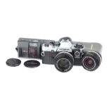 An Olympus OM-10 SLR Camera,