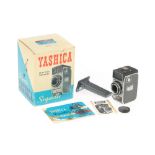 A Yashica Sequelle 35mm Half Frame Viewfinder Camera,