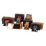 Four Folding Kodak Cameras,