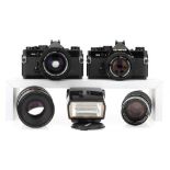 Two Olympus SLR Cameras,