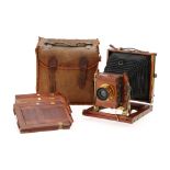 A T.E.B. No.1A Mahogany & Brass Quarter Plate Folding Bed Camera,