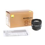 A Nikon AF Nikkor 85mm f/1.8D Lens,