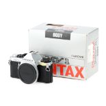 A Pentax MV1 35mm SLR Camera Body,