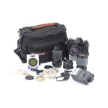 A Good Canon F-1 35mm SLR Camera Outfit,