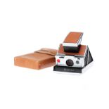 A Polaroid SX-70 Land Camera,