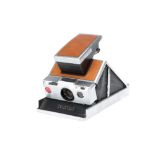 A Polaroid SX-70 Land Camera,