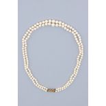 A Double String Graduated Pearl Necklace,