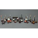 A Boxed Set of 20 Mid-Twentieth Century Chinese Jade Carved Musical Instruments,