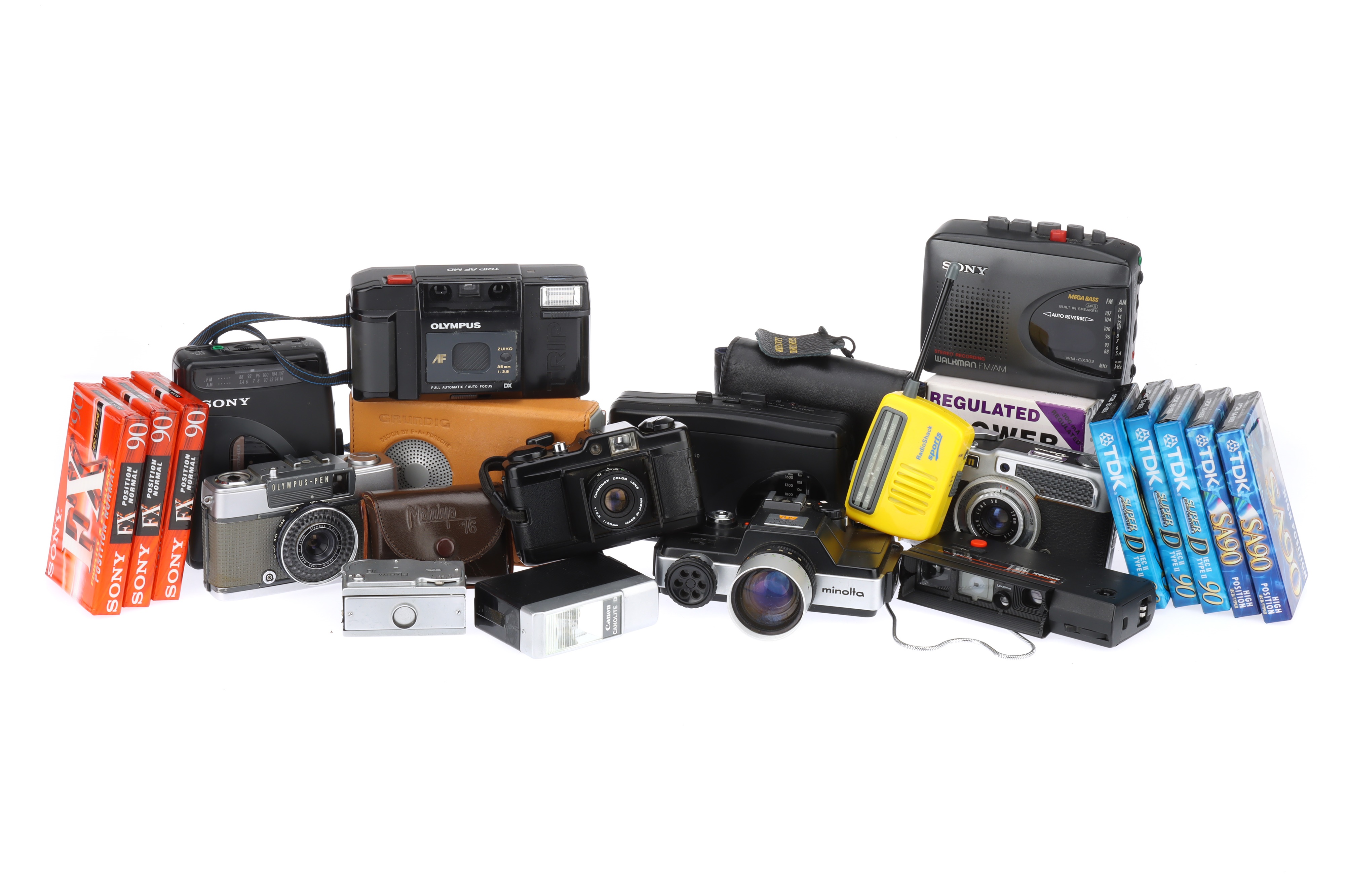 A Collection of Compact Cameras and Portable Audio Equipment