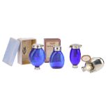 A Collection of Pocket Spitting Flasks and Spittoons,