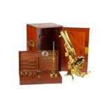 A Large Victorian Binocular Microscope Outfit,