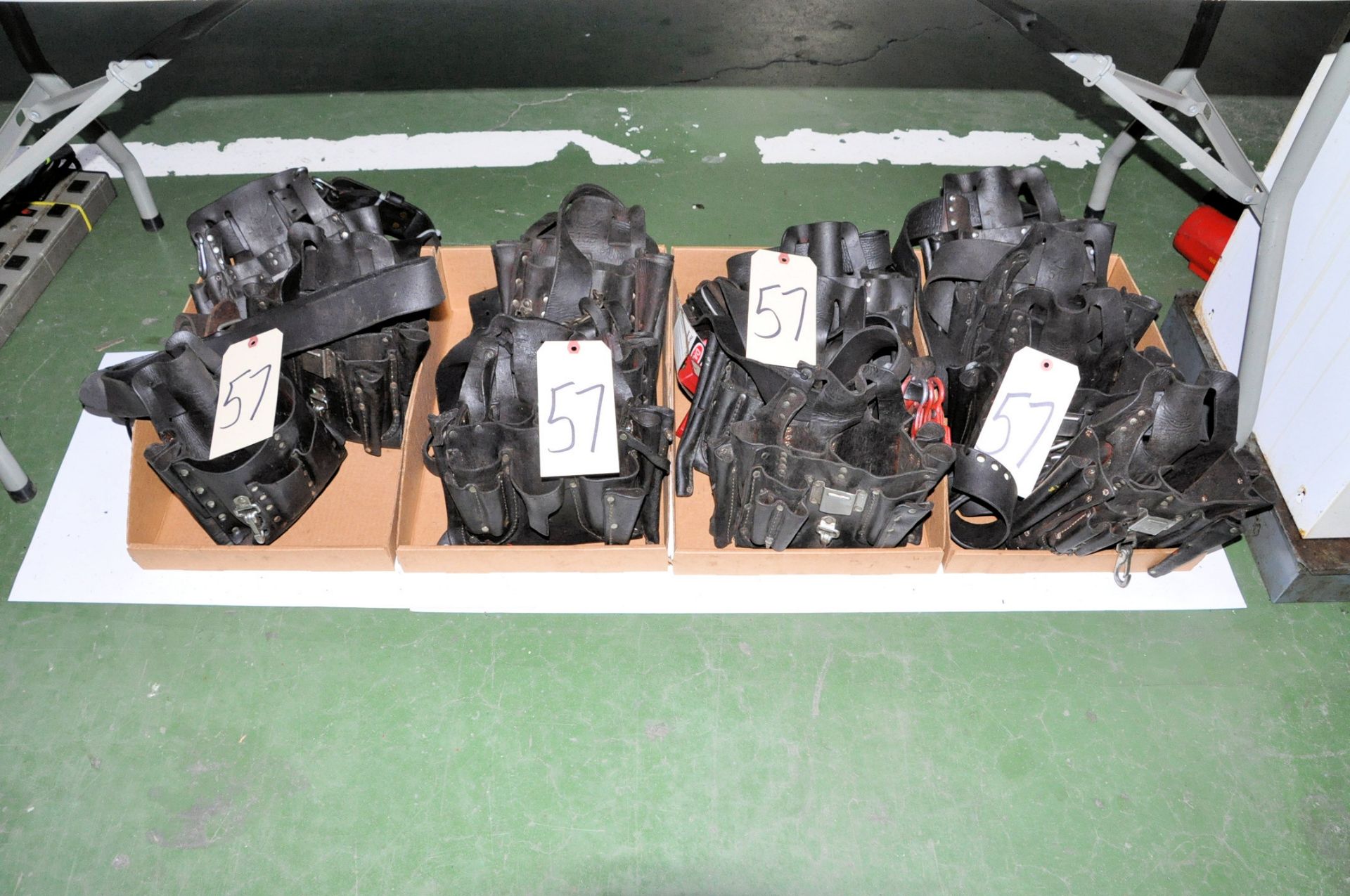 Lot-Various Tool Pouches with Belts in (4) Boxes on Floor Under (1) Table, (E-3)