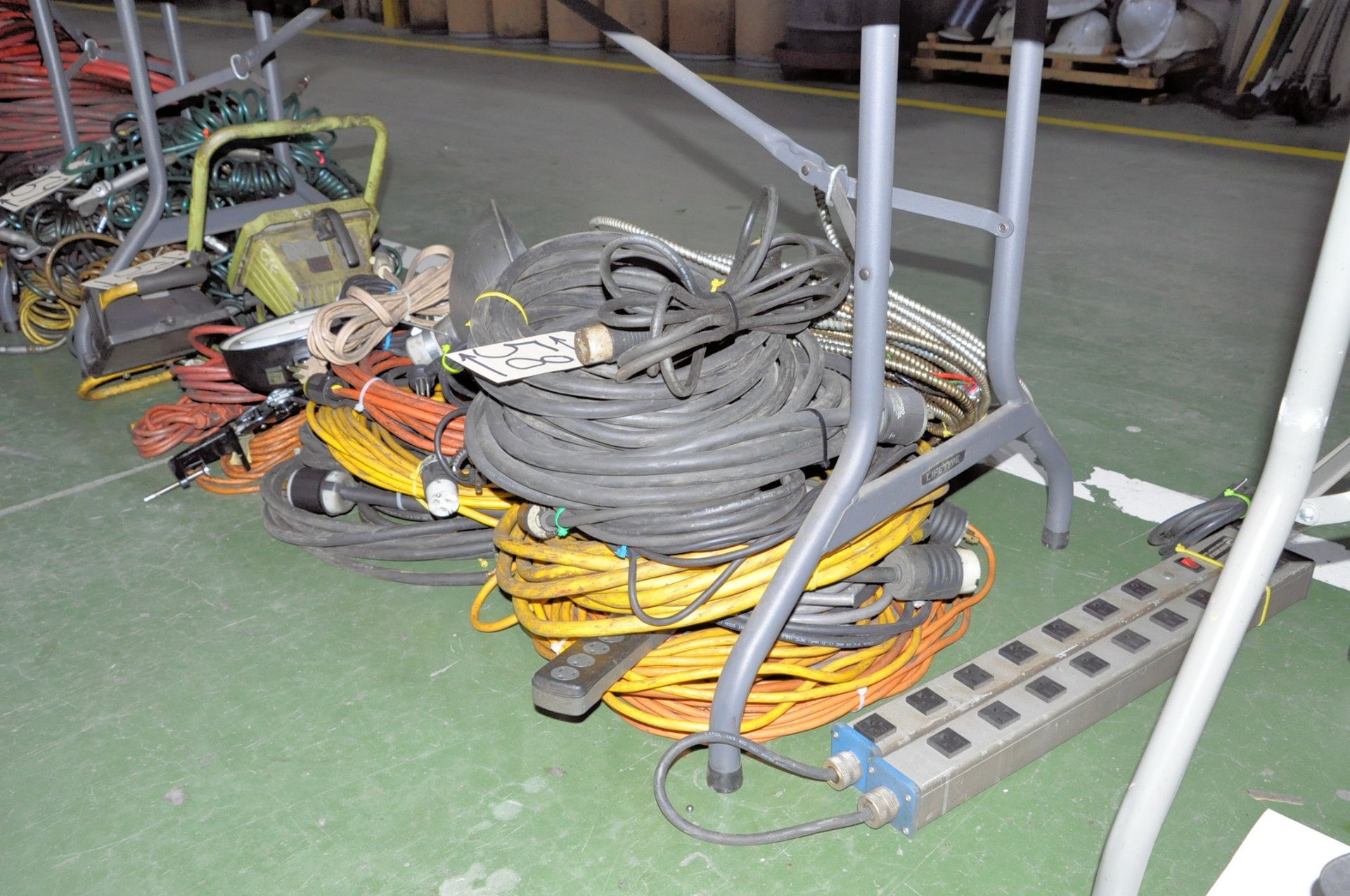 Lot-Extension Cords, Lights and Flex Conduit on Floor Under (1) Table, (E-3)