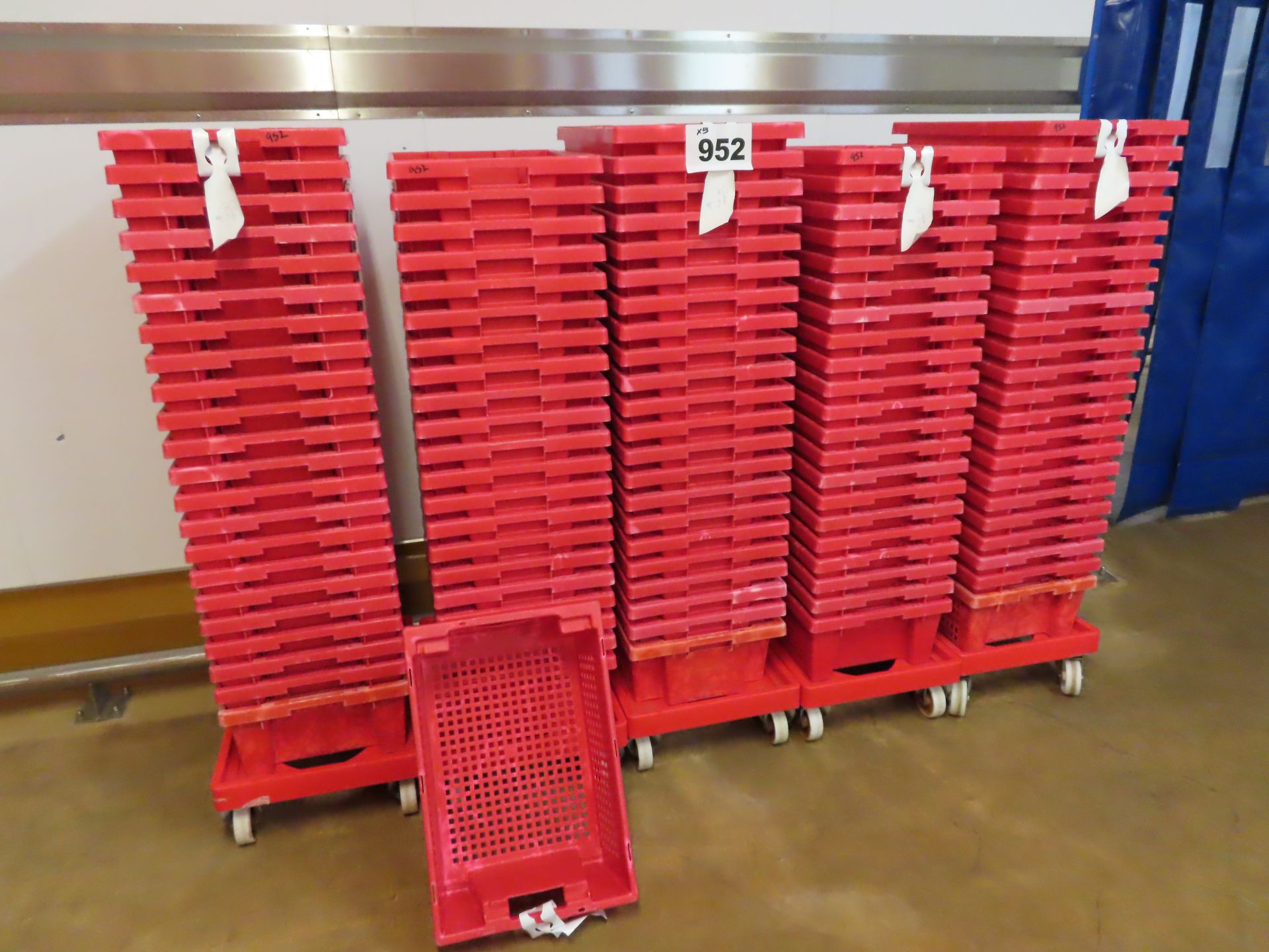 5 X DOLLIES HOLDING 30 OF RED PERFORATED TRAYS per dollie. 150 tray