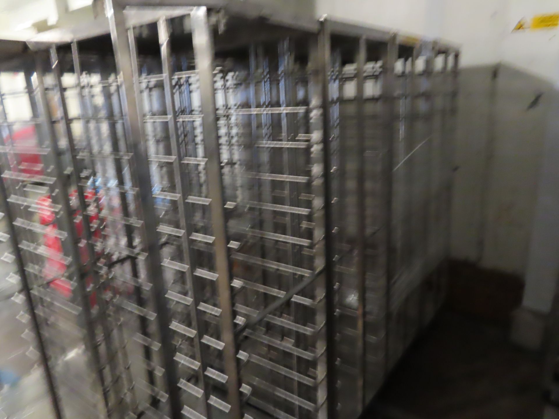 4 X TROLLEYS WITHOUT TRAYS.