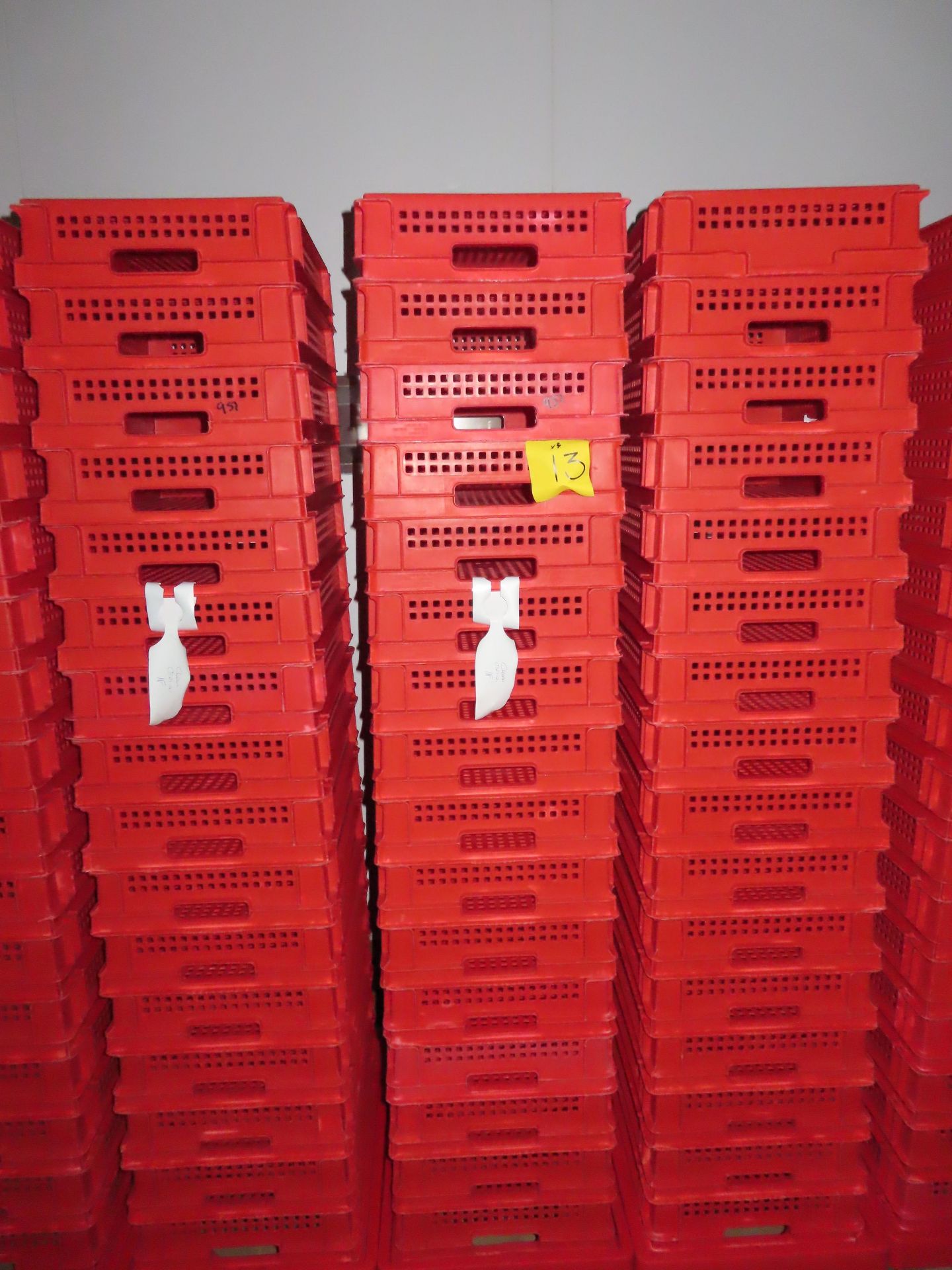 3 X DOLLIES WITH 48 RED PERFORATED TRAYS.