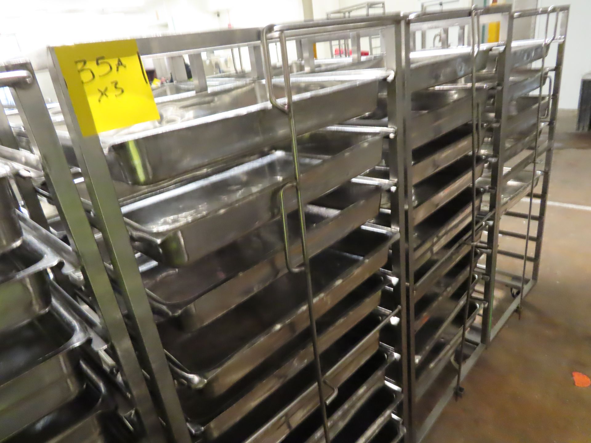 3 X DOUBLE TROLLEYS WITH 45 TRAYS.