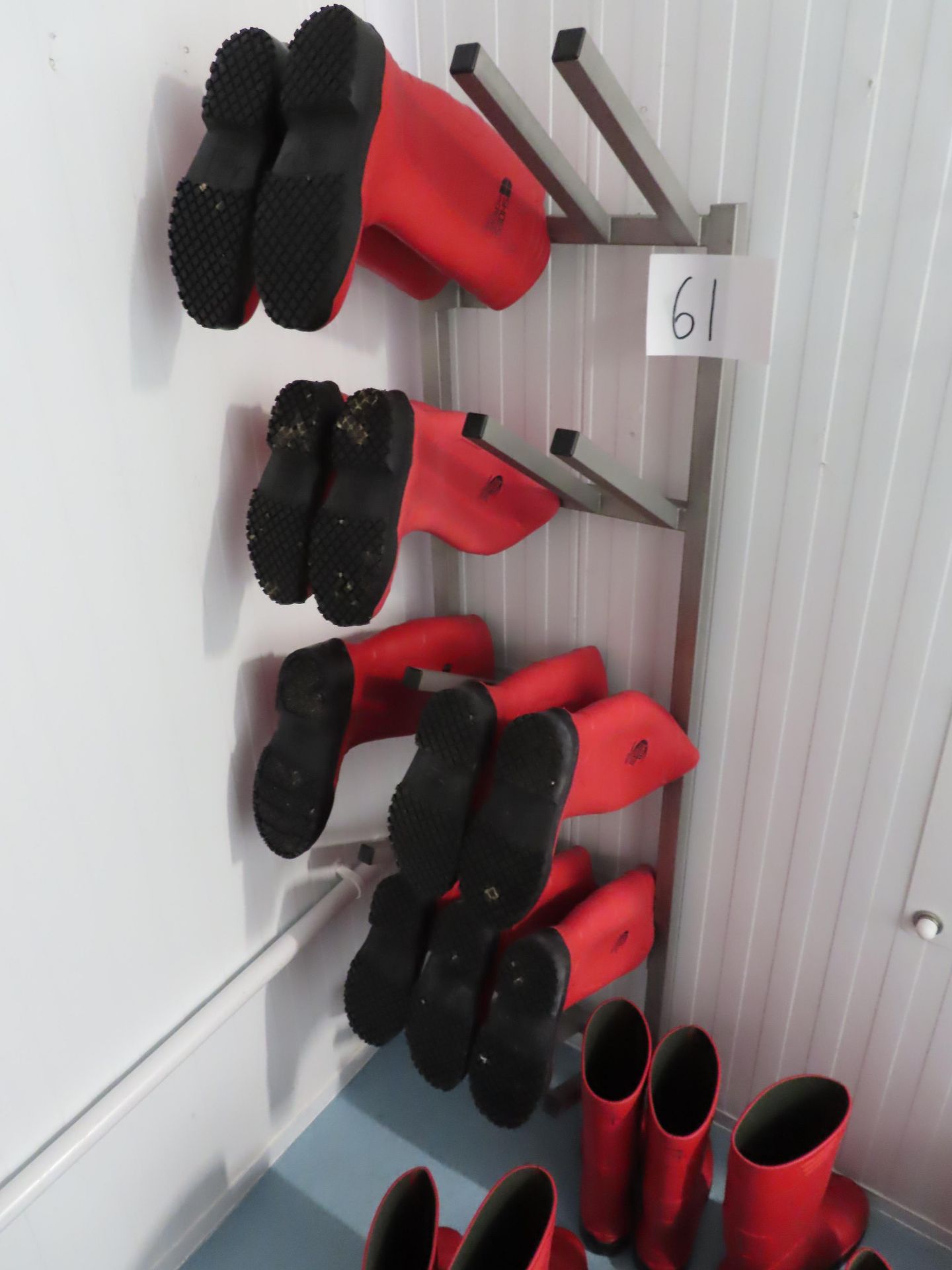 WALL MOUNTED WELLIE HOLDER.