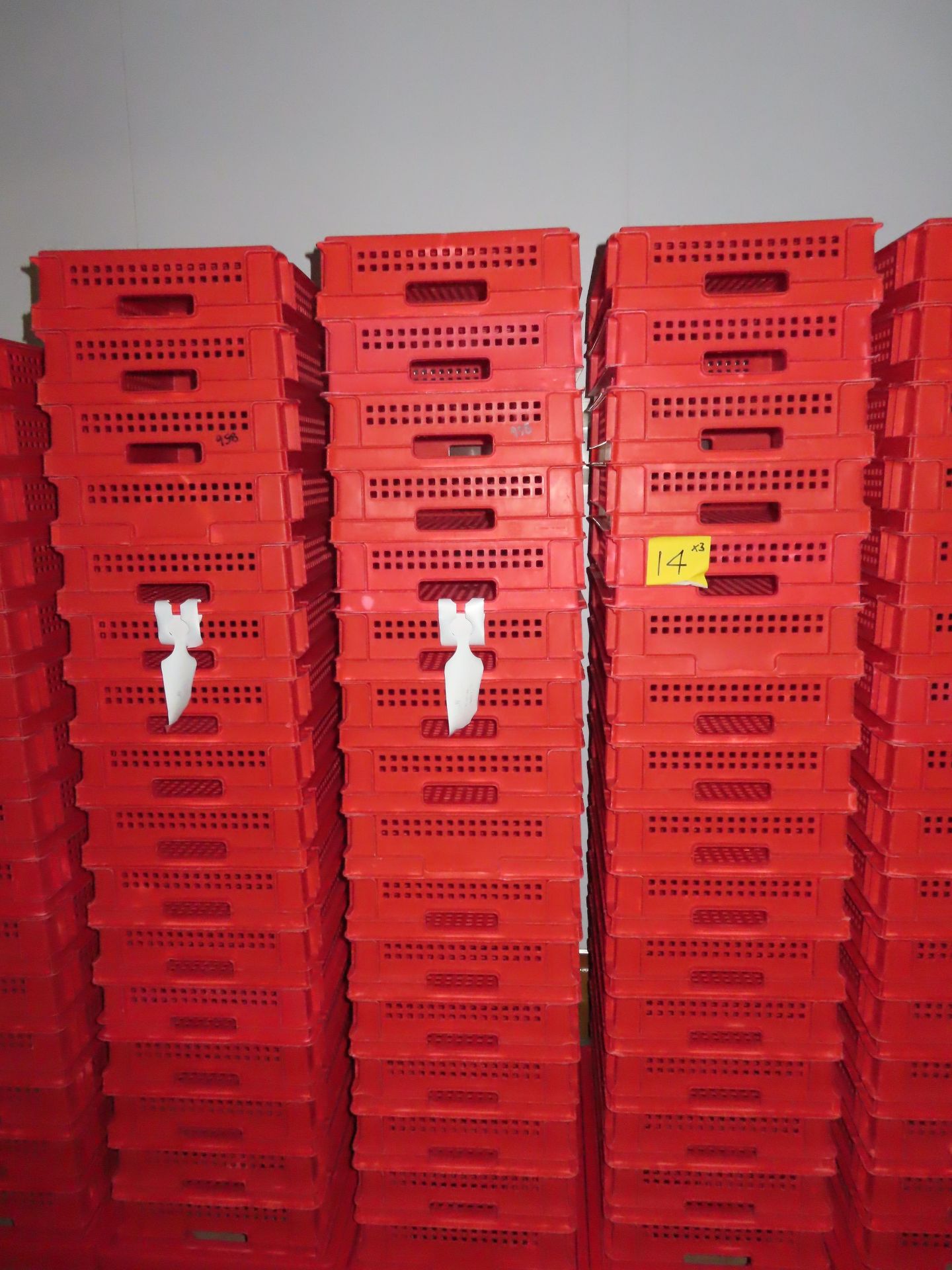 3 X DOLLIES WITH 48 RED PERFORATED TRAYS.