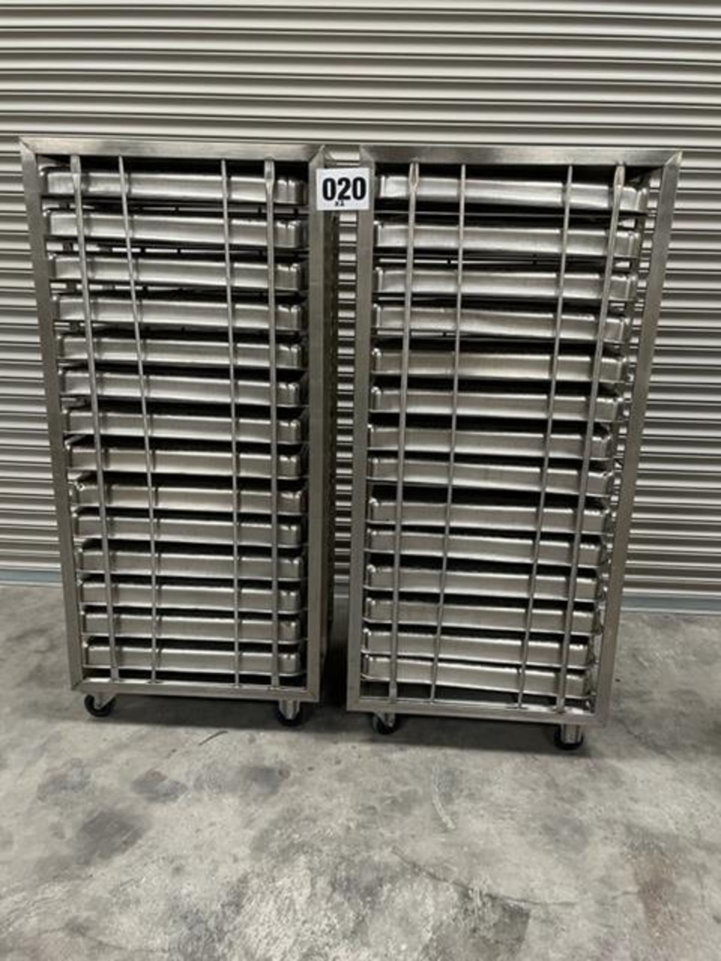 2 X UNITECH S/S RACKS COMPLETE WITH 14 GASTRO TRAYS IN EACH RACK.