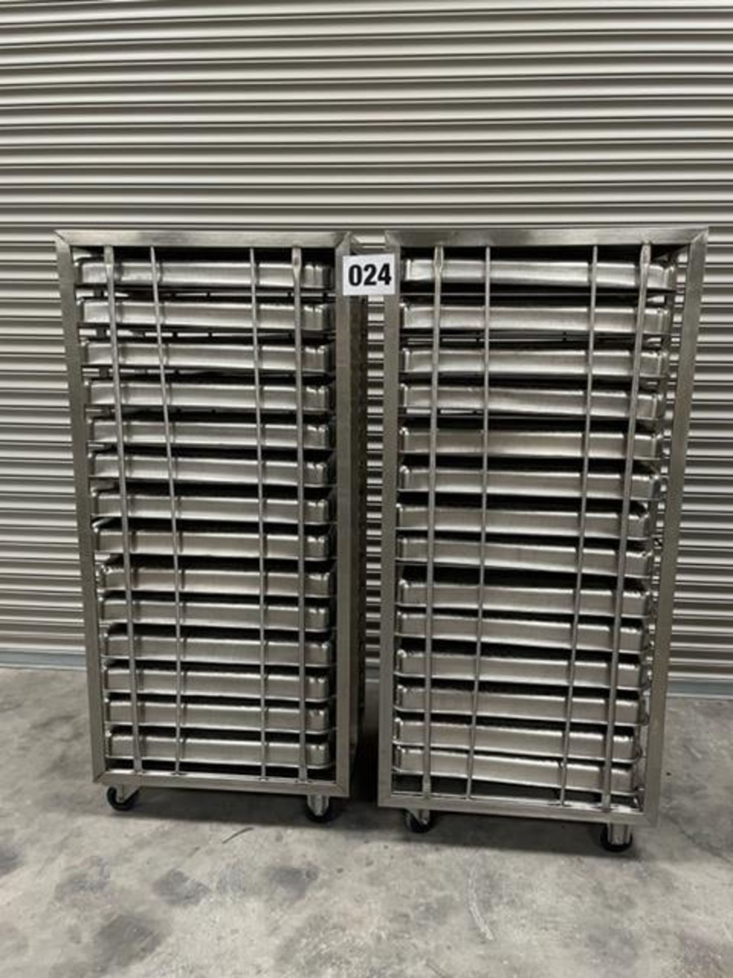 2 X UNITECH S/S RACKS COMPLETE WITH 14 GASTRO TRAYS IN EACH RACK.