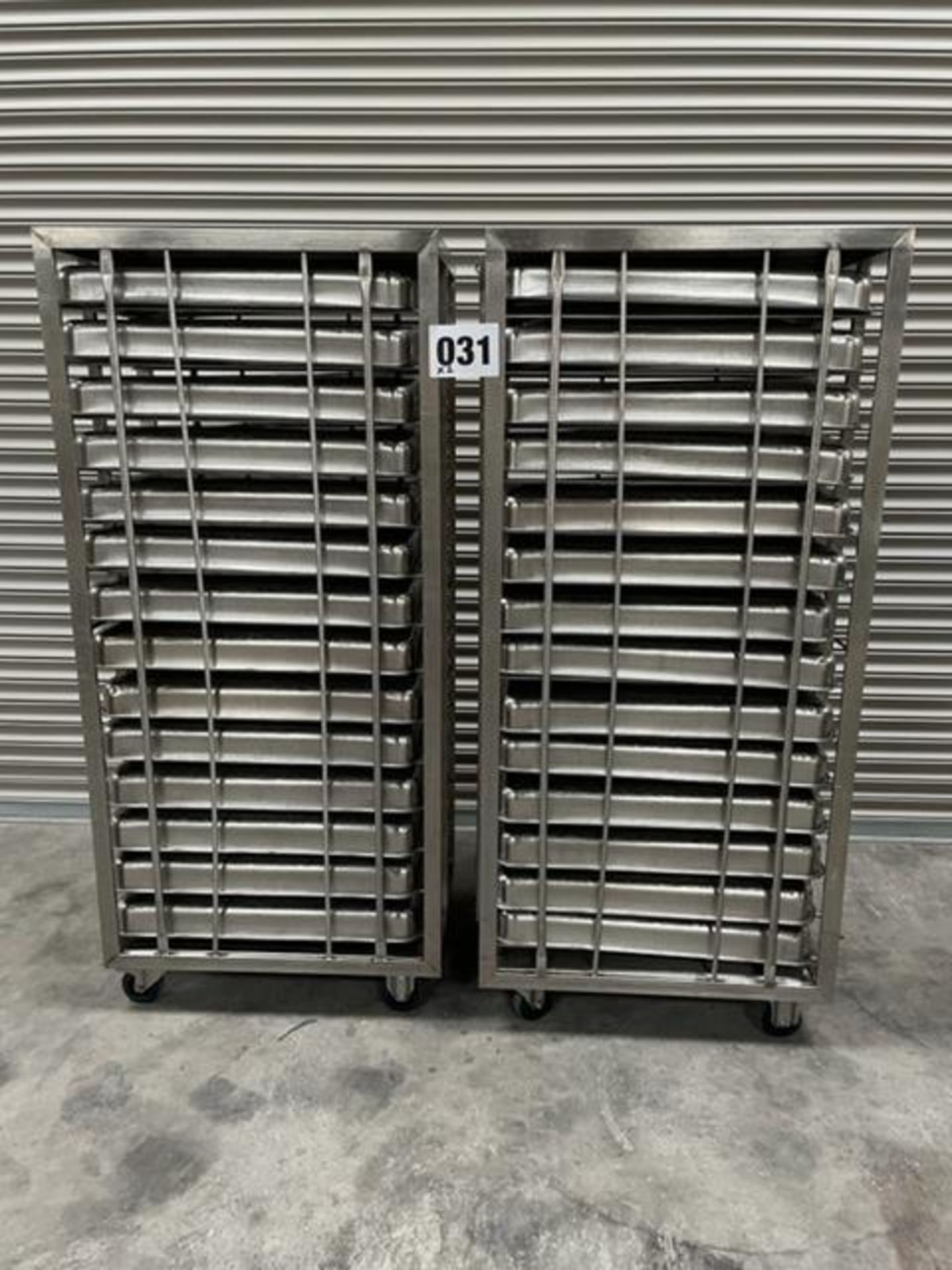 2 X UNITECH S/S RACKS COMPLETE WITH 14 GASTRO TRAYS IN EACH RACK.