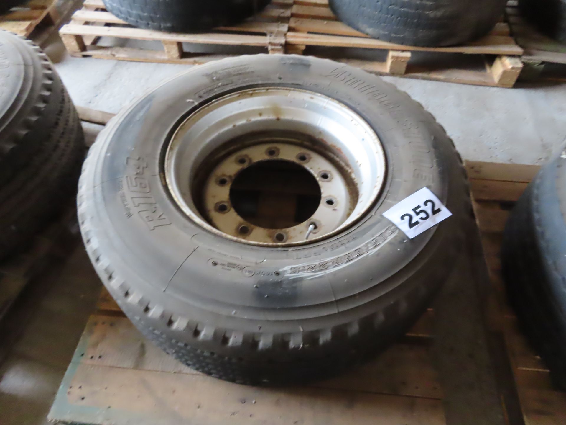 BRIDGESTONE R164 TYRE AND WHEEL.