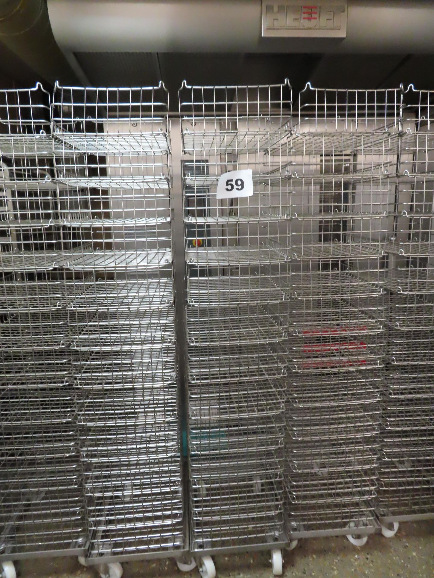 5 X DOLLIES CONTAINING 12 WIRE BASKETS PER DOLLY. TOTAL 60 TRAYS.