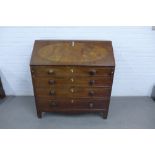 19th century mahogany bureau, the fall front opening to reveal a satinwood fitted interior, with
